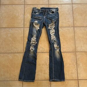 Very Distressed Low Rise Jeans